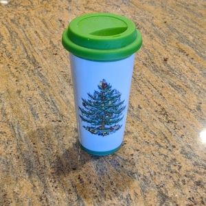 Travel mug with silicone lid